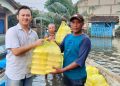 Salurkan Nasi Kotak, Burhan Peduli Warga Terdampak Banjir